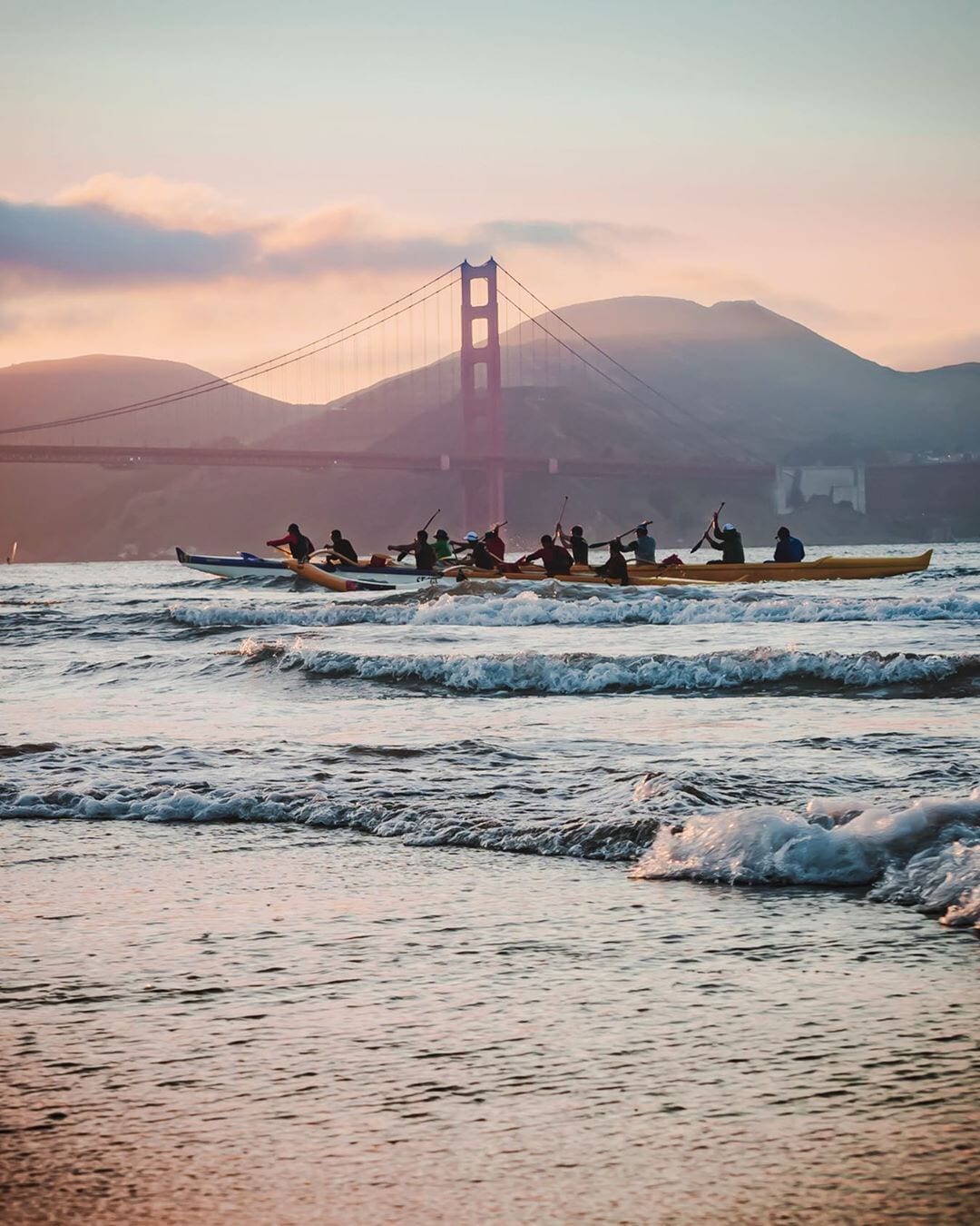Rowers beneath the Golden Gate Bridge in San Francisco
